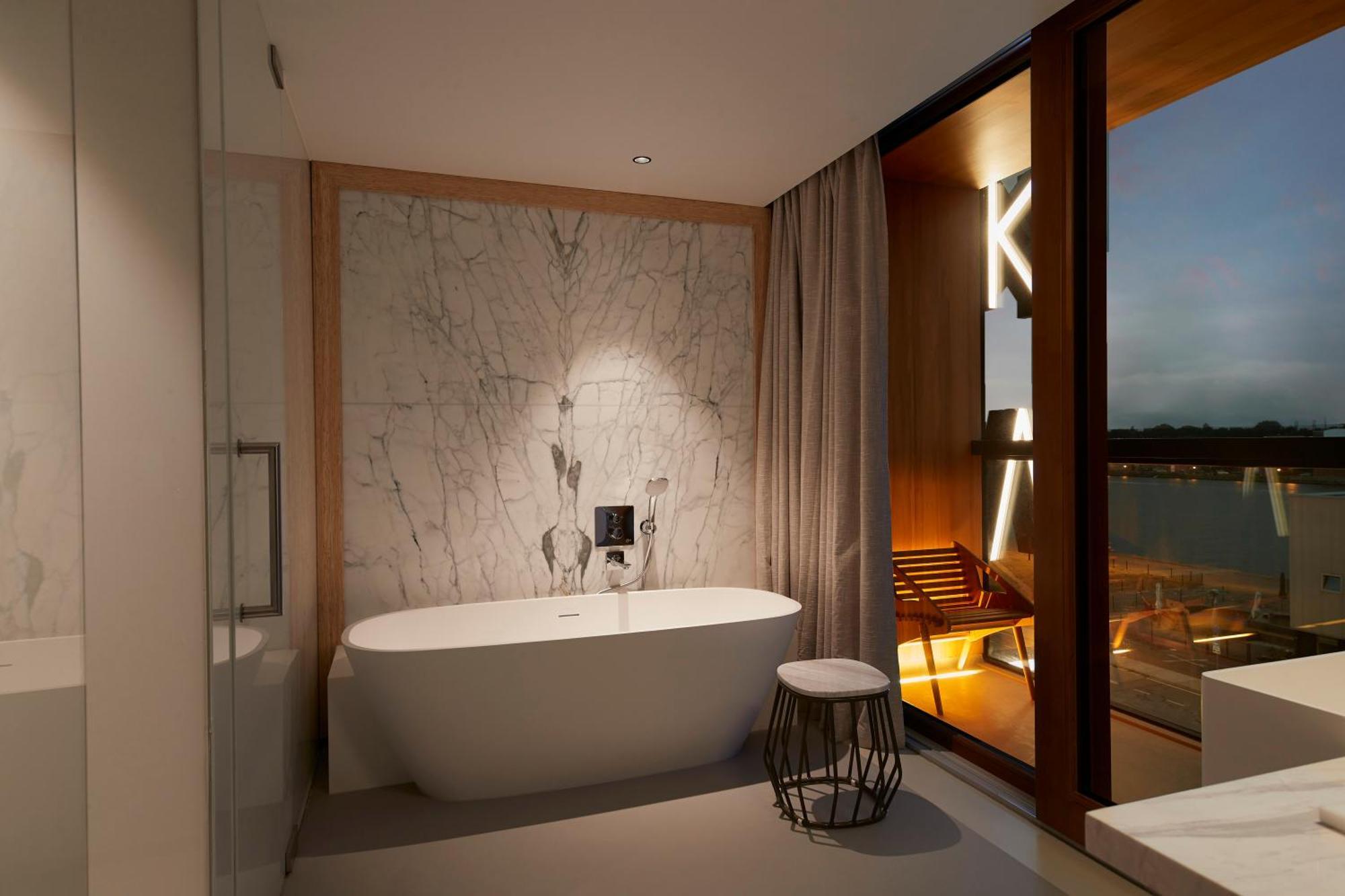 Extra Large Superior Room Bath Shower & Balcony